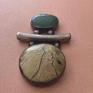 Unique Artisan silver and (unknown) stone pendant